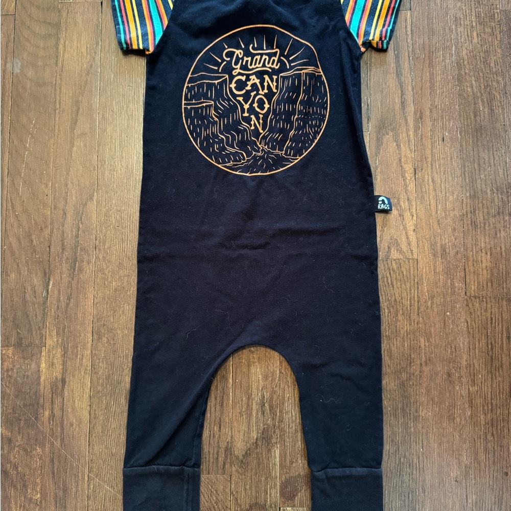 Rags to Raches Black Grand Canyon Romper with Striped Sleeves